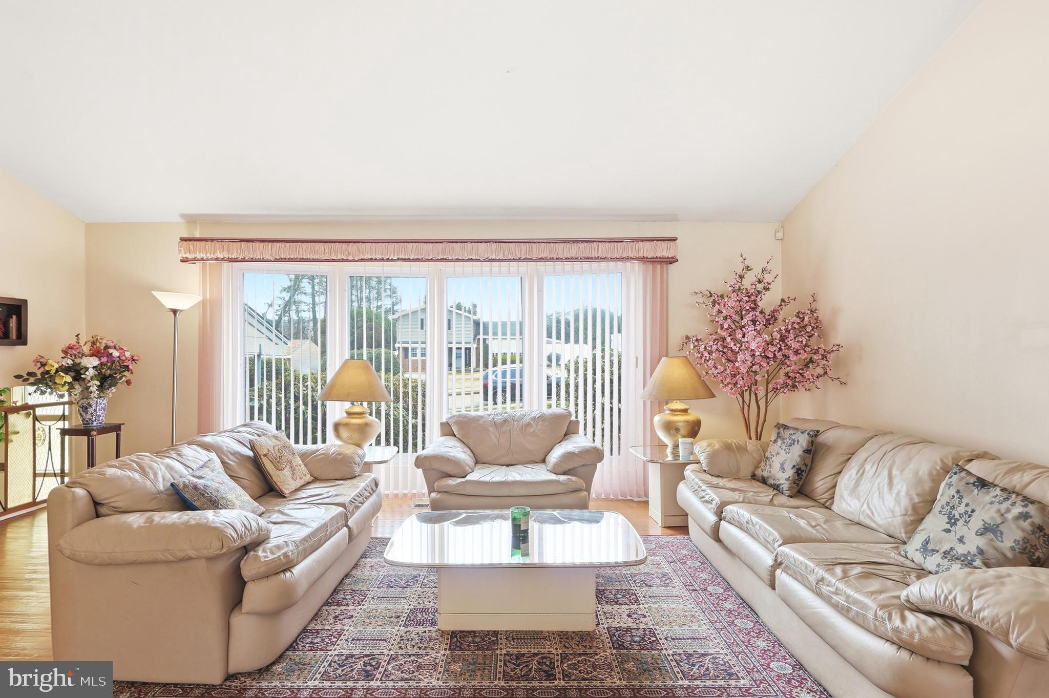 123 Pocasset Road Philadelphia, PA 19115 - Photo 7 of 35 a living room with furniture and a large window