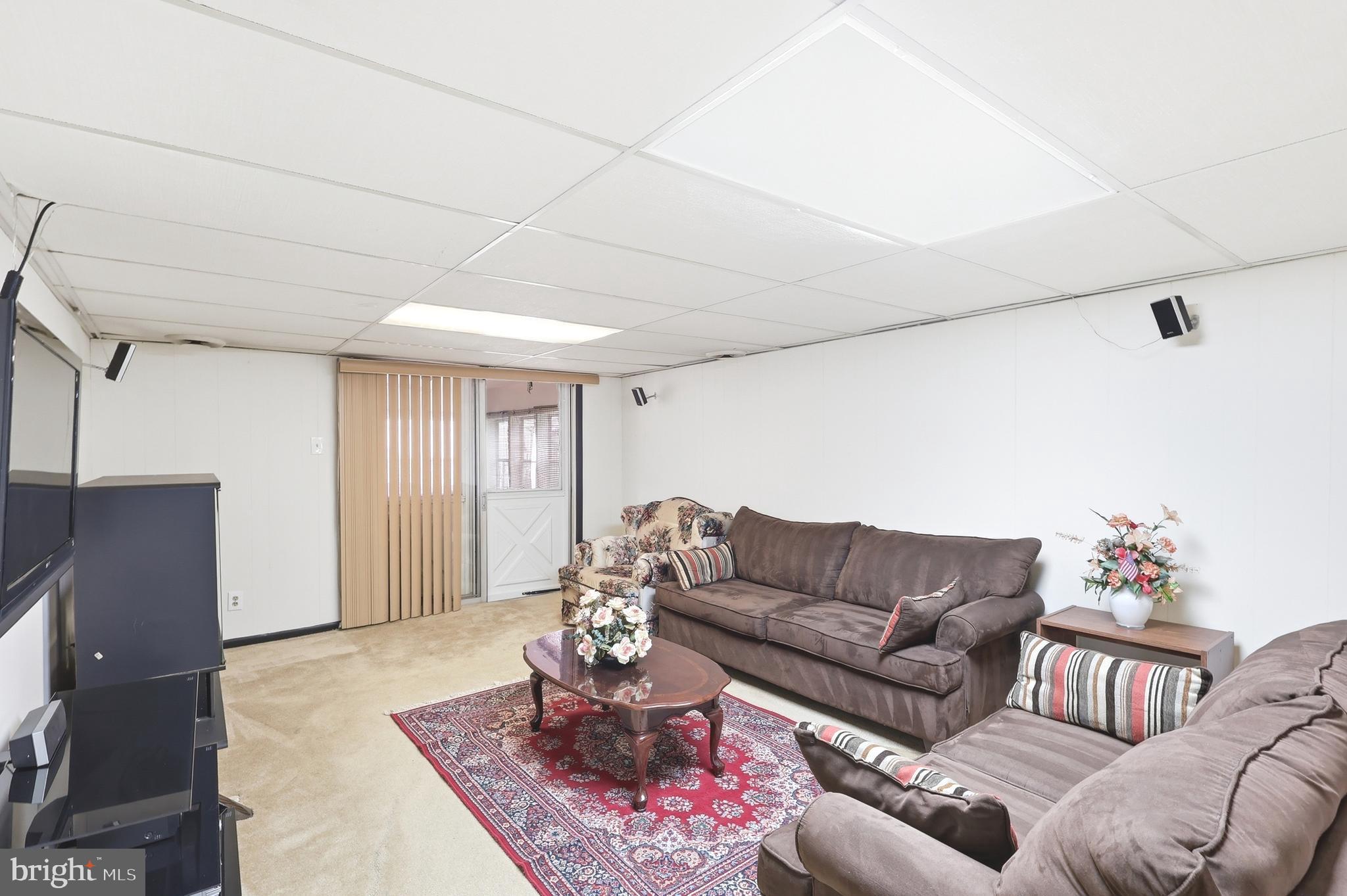 123 Pocasset Road Philadelphia, PA 19115 - Photo 9 of 35 a living room with furniture and wooden floor