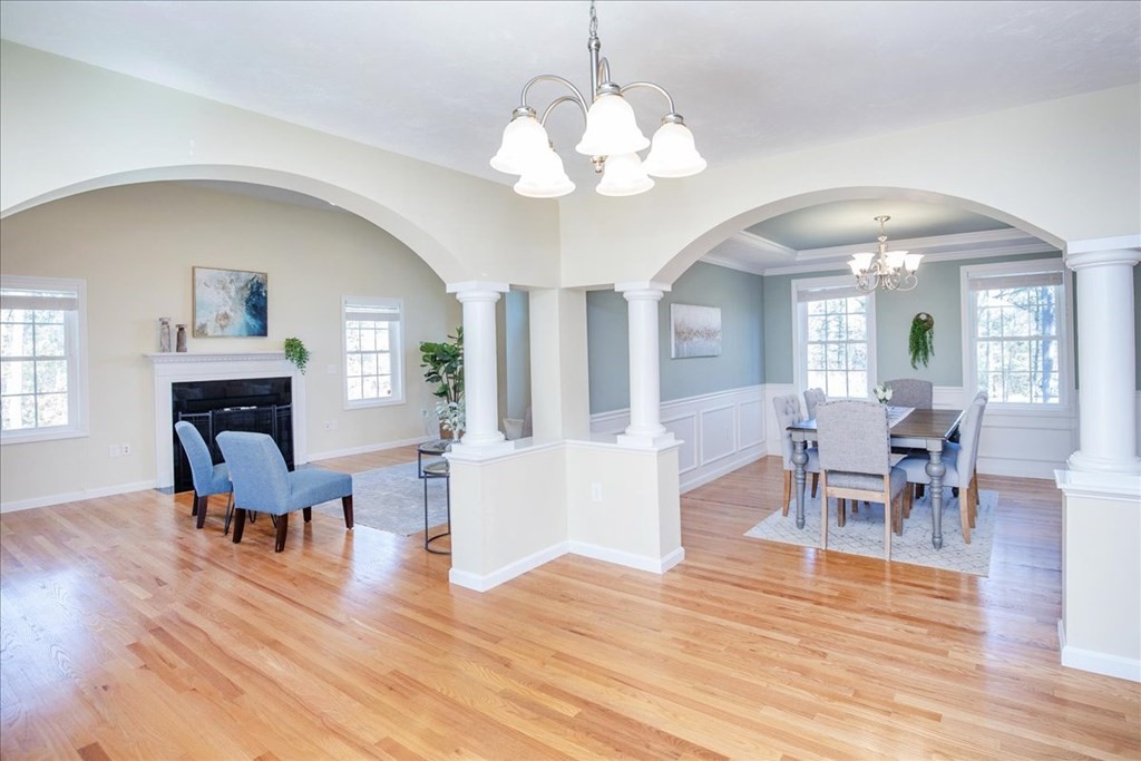 294 River Street Billerica, MA 01821 - Photo 21 of 42 a living room with furniture and a wooden floor