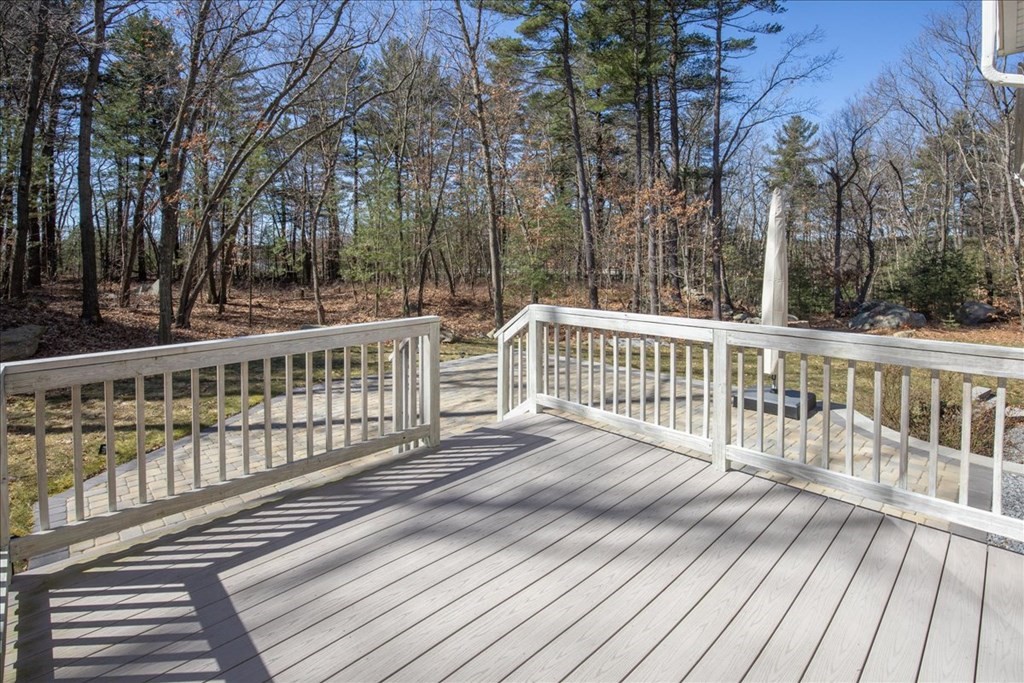 294 River Street Billerica, MA 01821 - Photo 39 of 42 a view of a wooden deck and trees