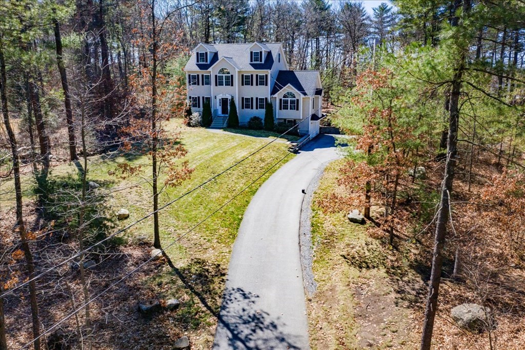 294 River Street Billerica, MA 01821 - Photo 4 of 42 a view of a house with a large trees with a yard