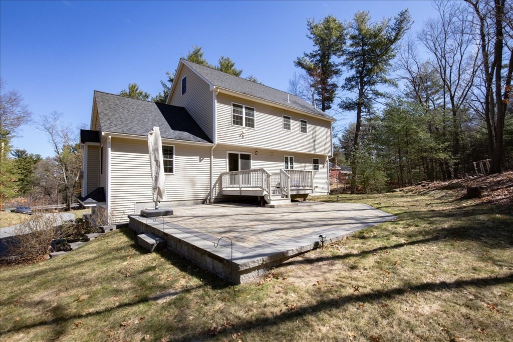 294 River Street Billerica, MA 01821 - Photo 41 of 42 a view of a house with snow on the side of the road