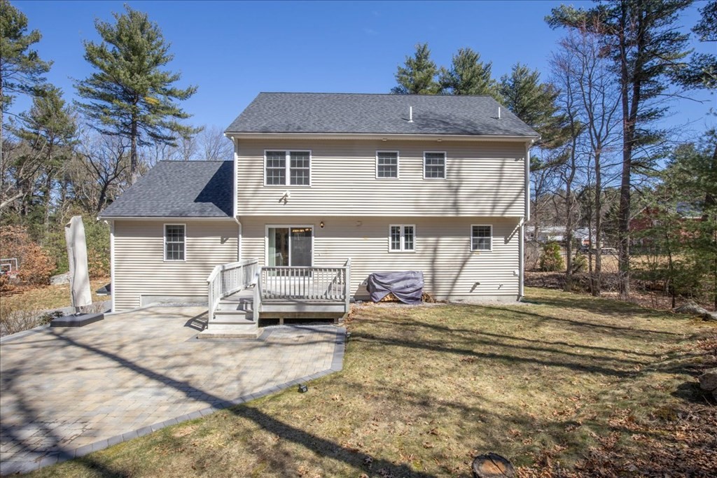 294 River Street Billerica, MA 01821 - Photo 42 of 42 a front view of a house with a yard outdoor seating and garage
