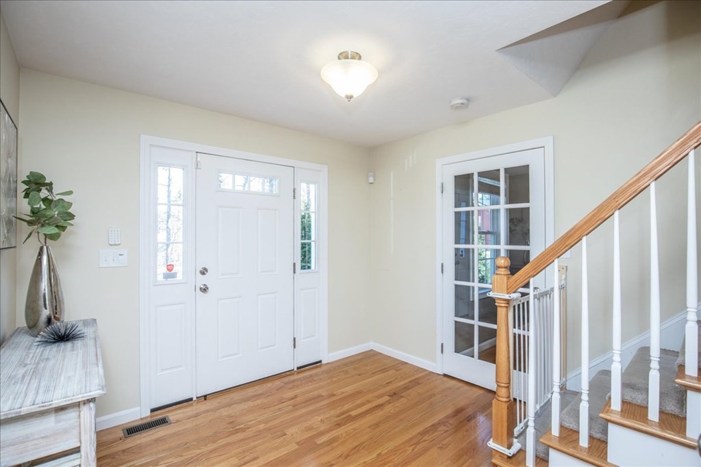 294 River Street Billerica, MA 01821 - Photo 5 of 42 a view of entryway with wooden floor