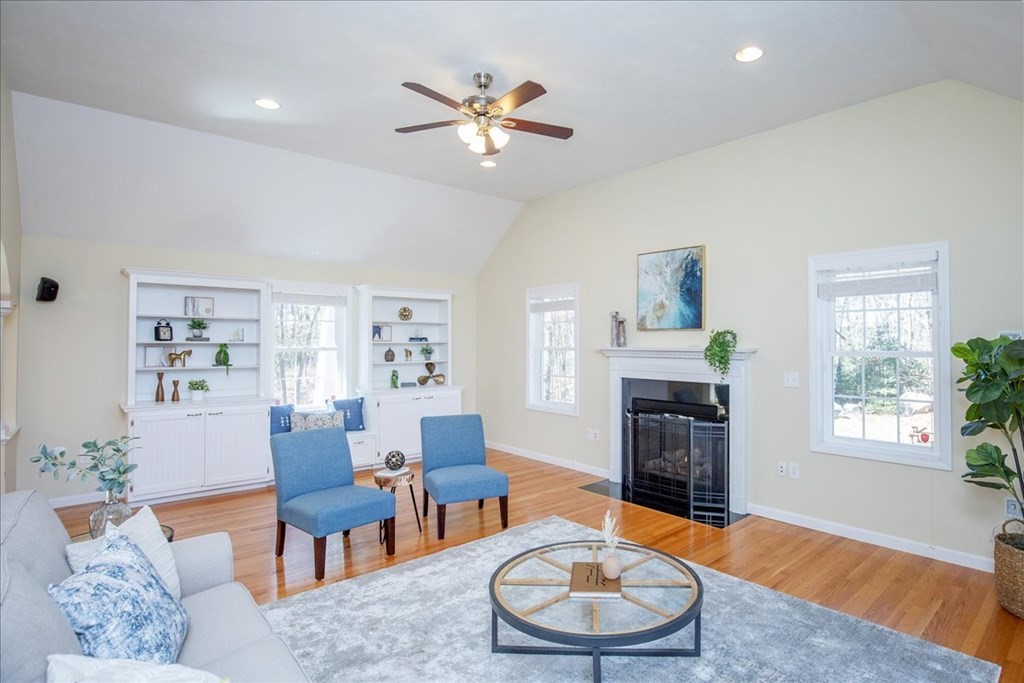 294 River Street Billerica, MA 01821 - Photo 9 of 42 a living room with furniture a fireplace and a window