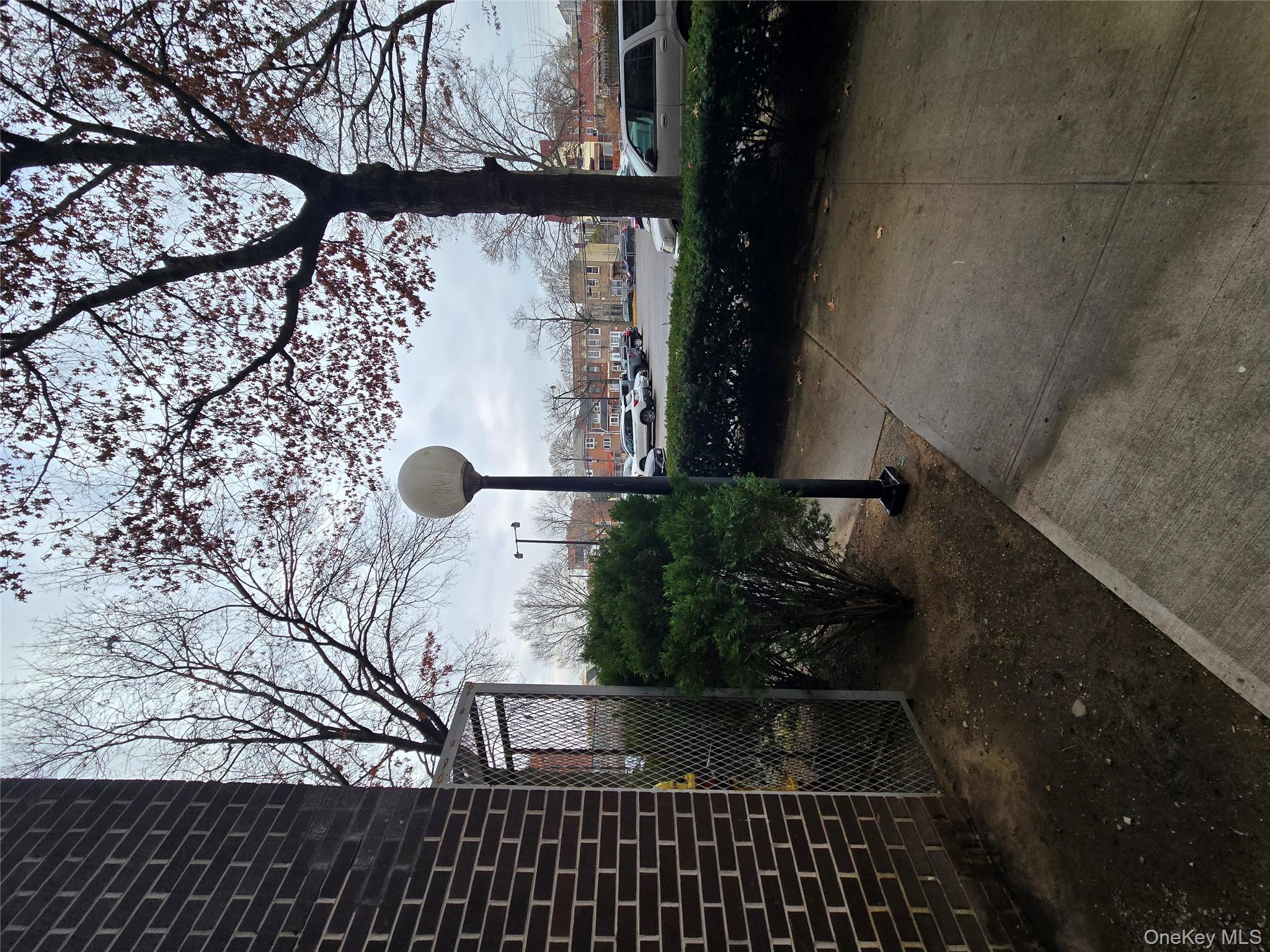 34-12 113th Street, Unit 7L Queens, NY 11368 - Photo 9 of 9 a view of a garden