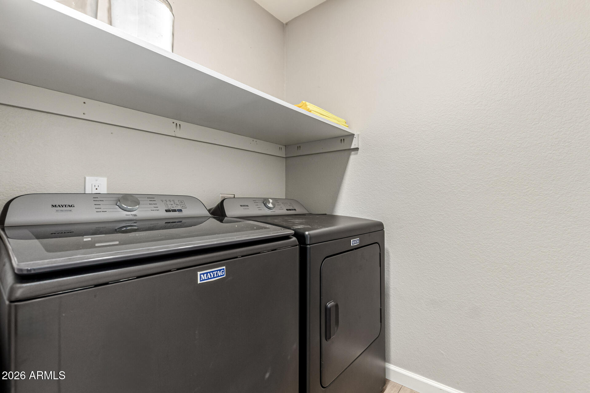 6455 East Raftriver Street Mesa, AZ 85215 - Photo 28 of 36 a utility room with dryer and washer