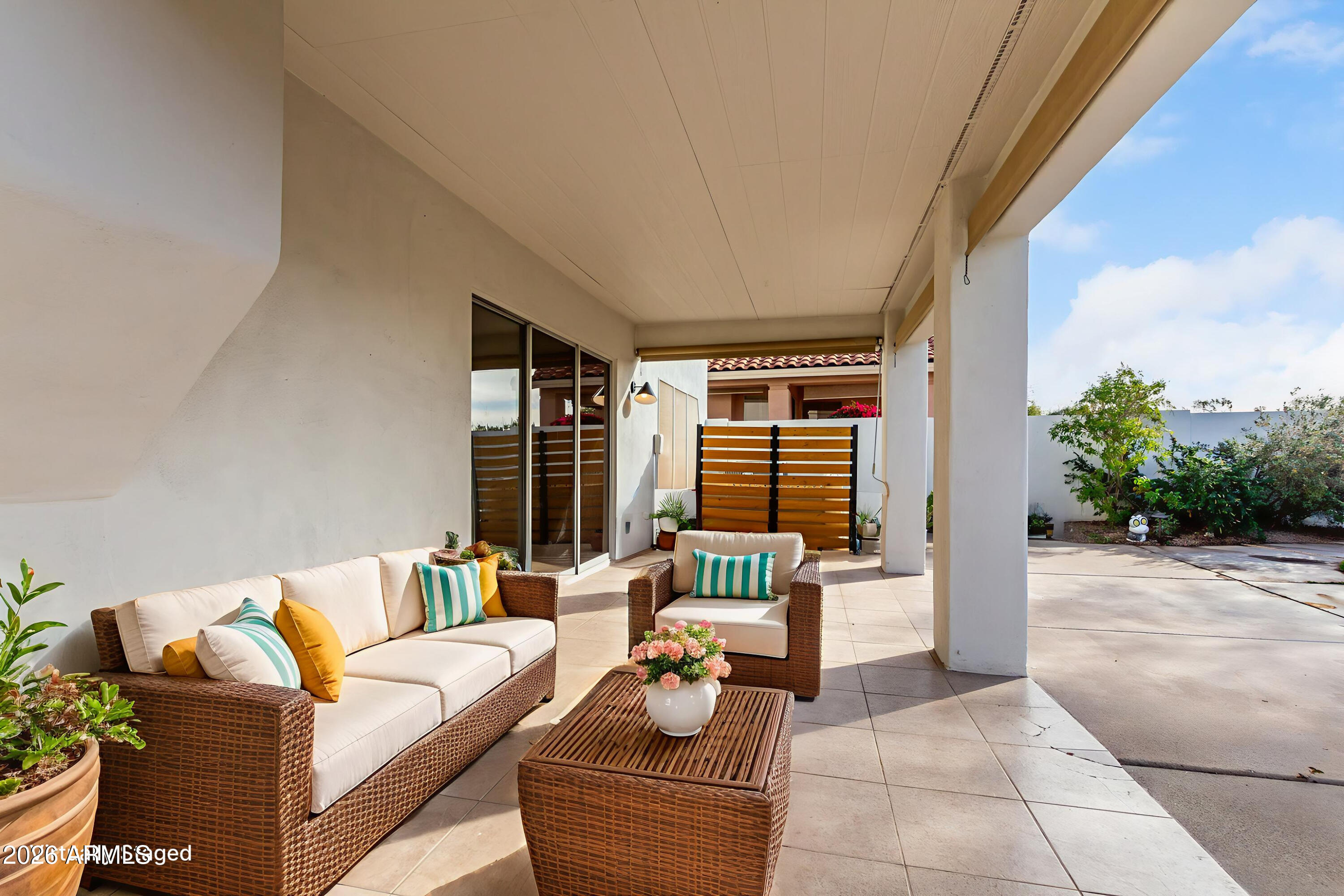 6455 East Raftriver Street Mesa, AZ 85215 - Photo 32 of 36 a outdoor living space with furniture and garden view