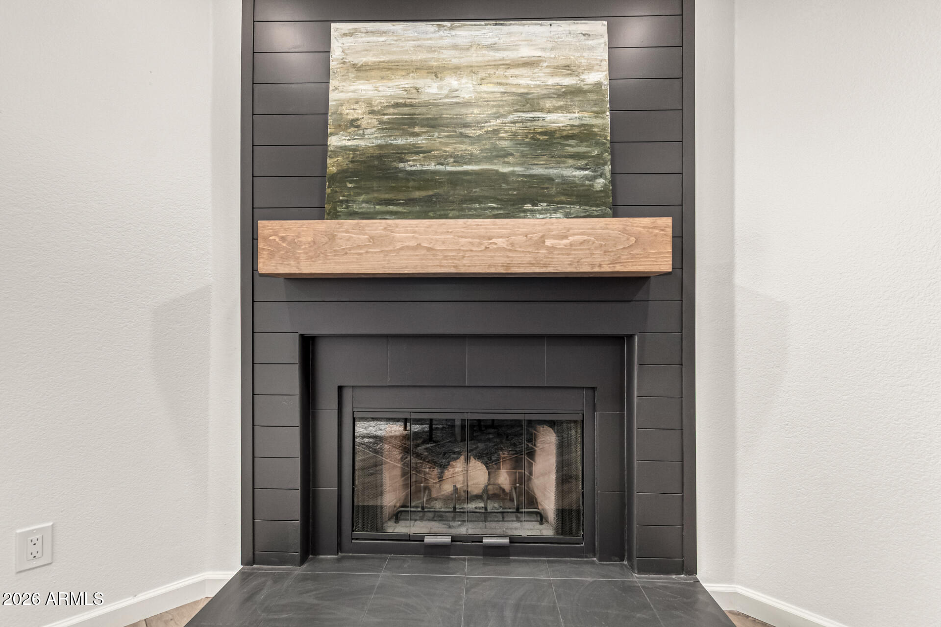 6455 East Raftriver Street Mesa, AZ 85215 - Photo 9 of 36 a room with a fireplace