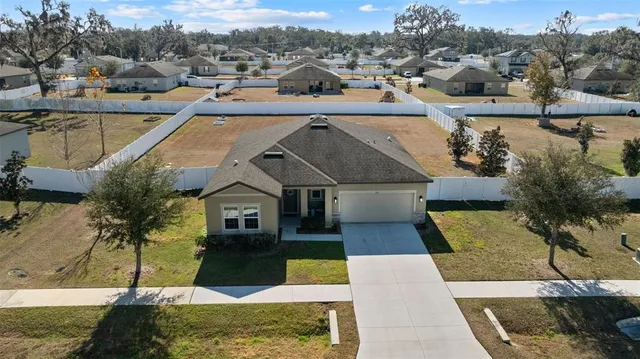 a picture of houses with a yard