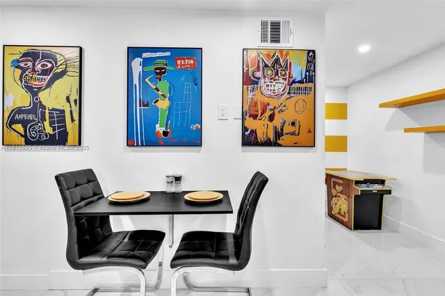 a view of a dinning room with furniture