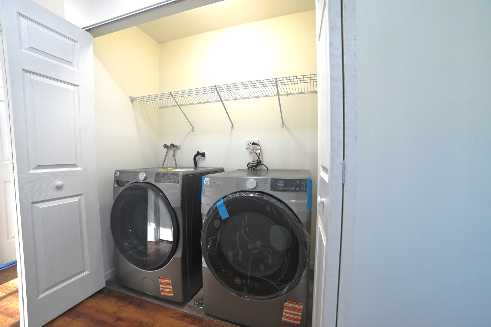 1944 Navarone Drive Naperville, IL 60565 - Photo 6 of 6 a room with a washer and dryer