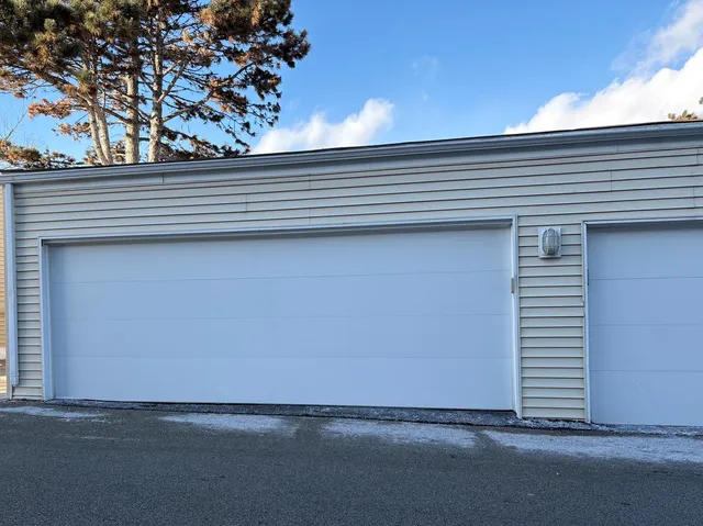 a view of a house with a street