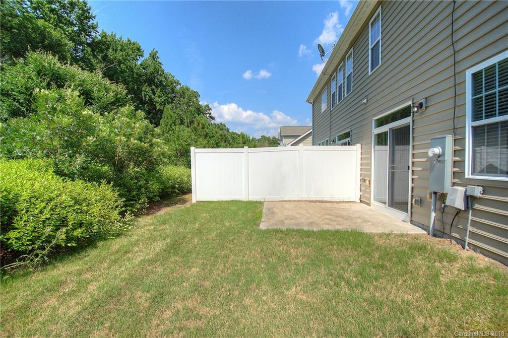 6831 Maricopa Road Charlotte, NC 28277 - Photo 22 of 23 a view of backyard of house with green space