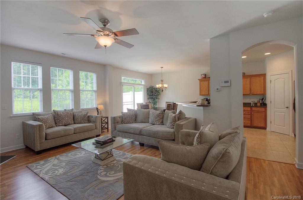 6831 Maricopa Road Charlotte, NC 28277 - Photo 7 of 23 a living room with furniture and a large window
