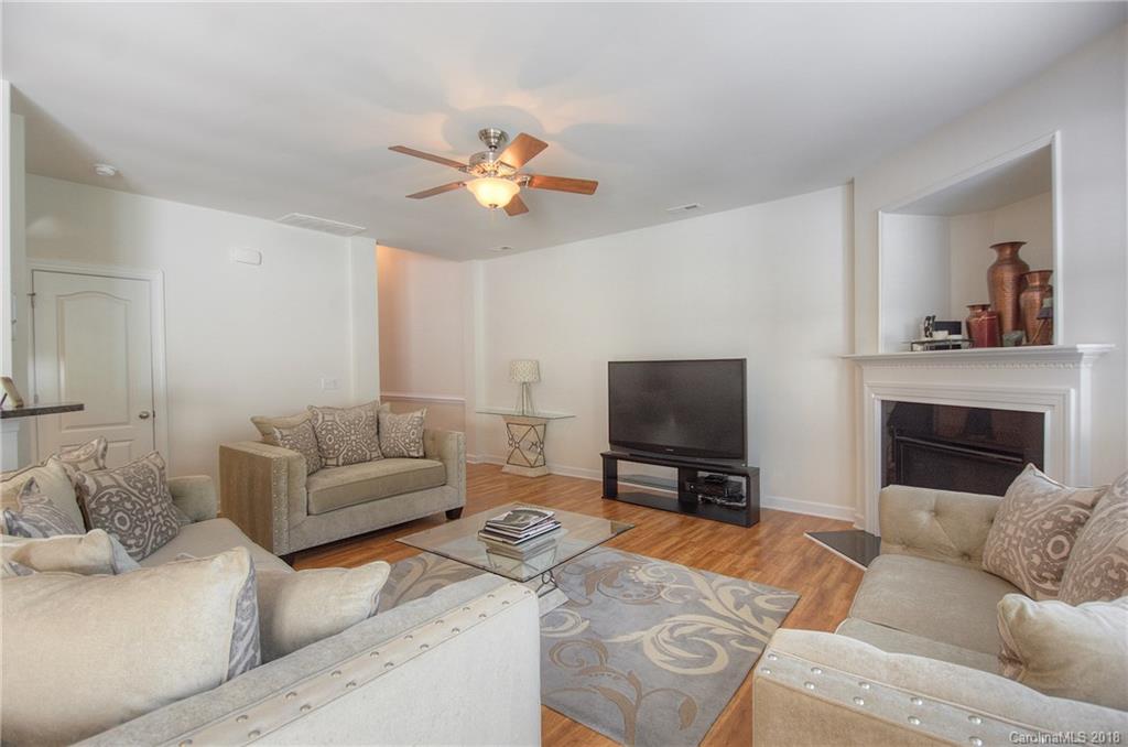 6831 Maricopa Road Charlotte, NC 28277 - Photo 10 of 23 a living room with furniture and a flat screen tv