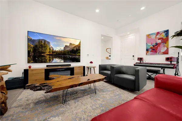 a view of a dining room with furniture and window