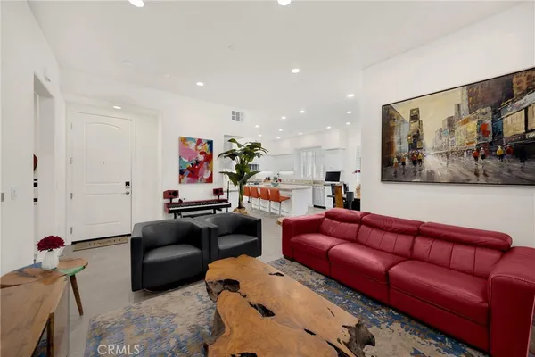 a view of a dining room with furniture and window