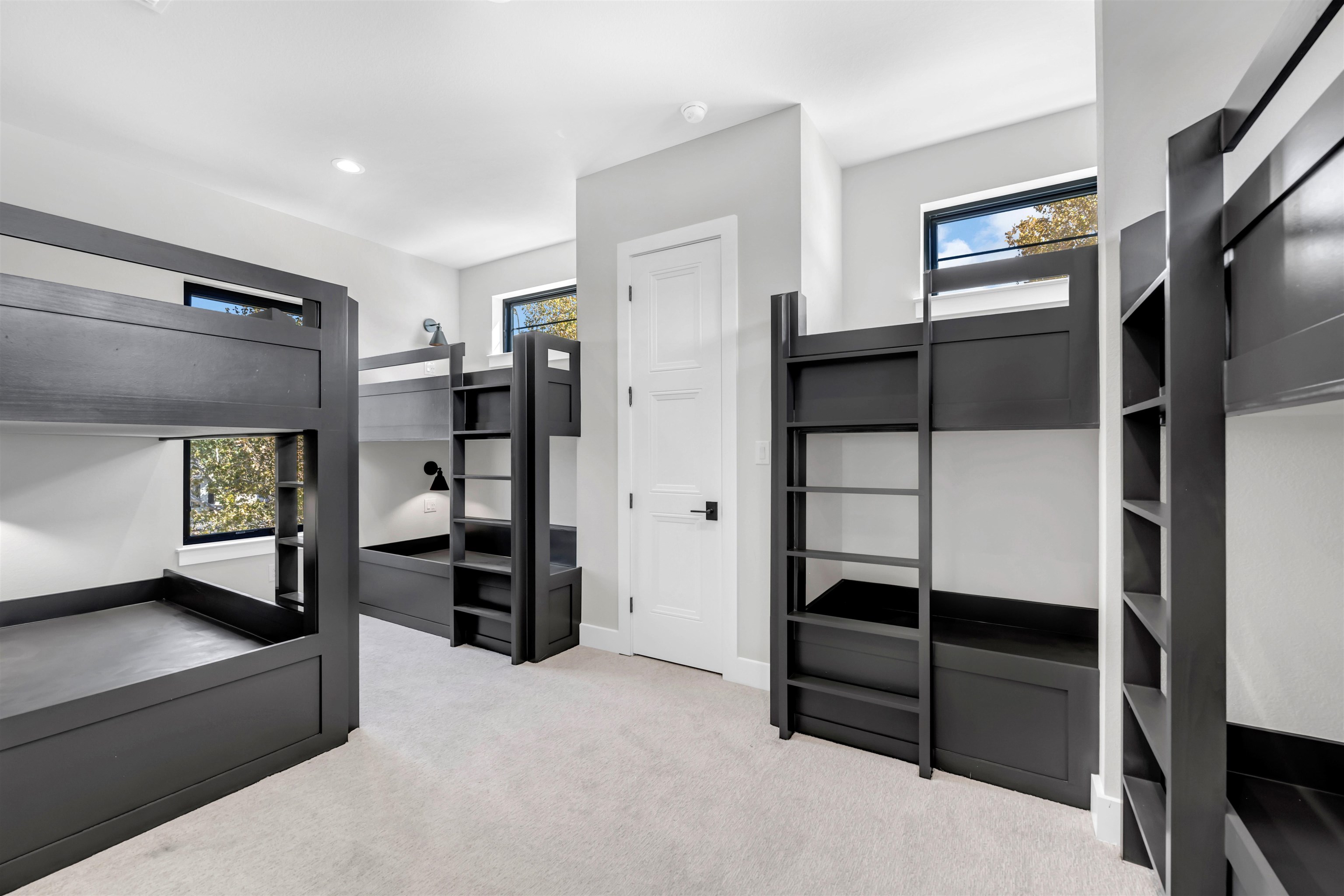 509 Lake Street Kingsland, TX 78639 - Photo 17 of 29 a view of walk in closet with clothes and shoes