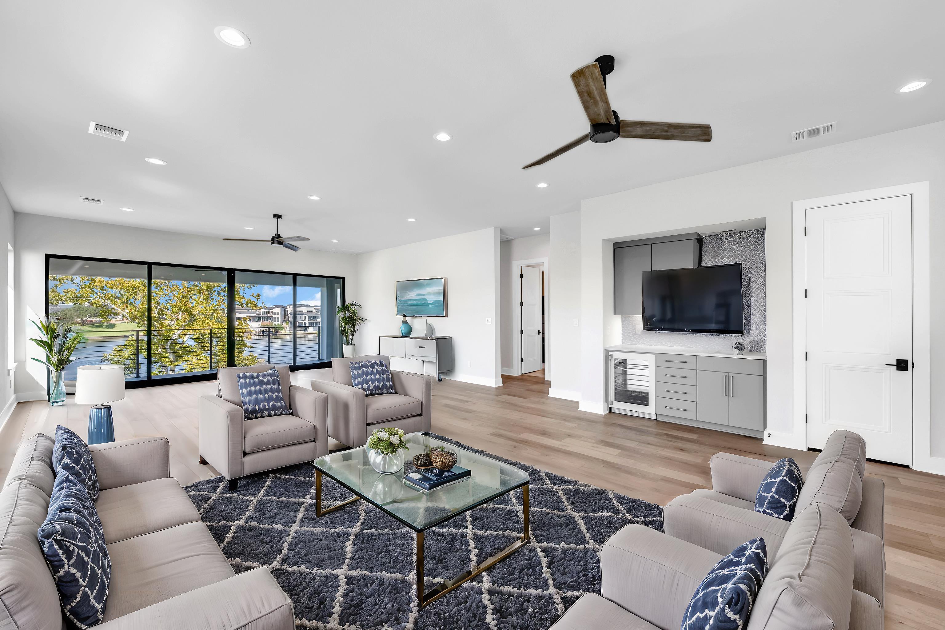 509 Lake Street Kingsland, TX 78639 - Photo 19 of 29 a living room with furniture and a flat screen tv
