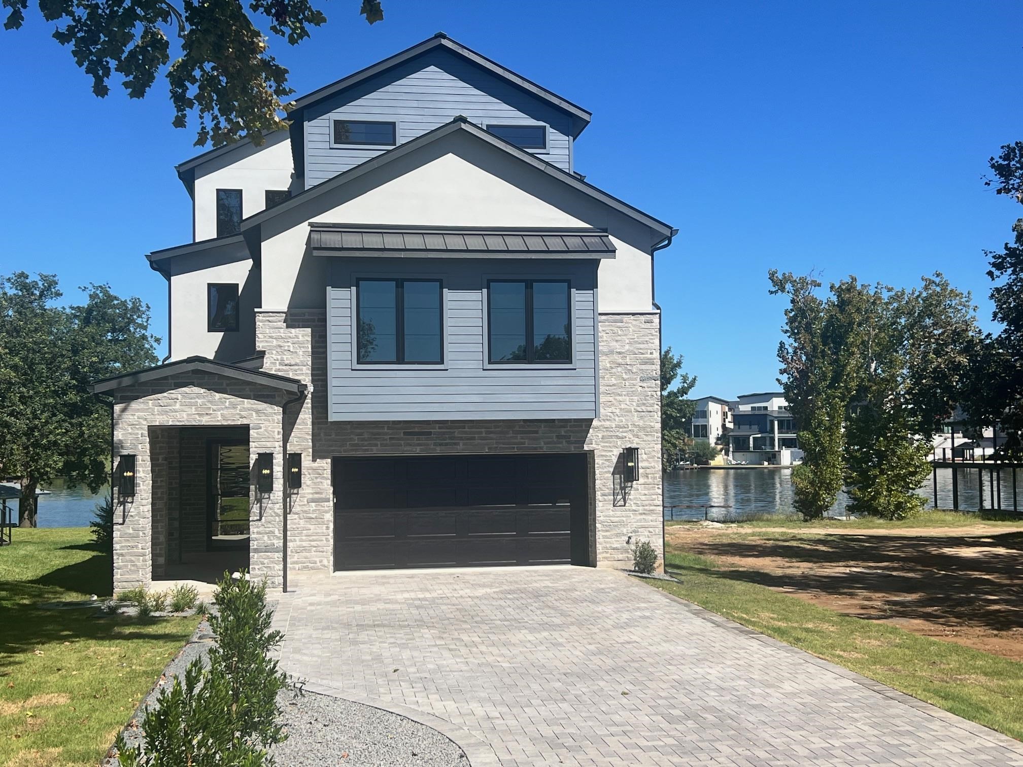 509 Lake Street Kingsland, TX 78639 - Photo 3 of 29 a front view of a house with a yard