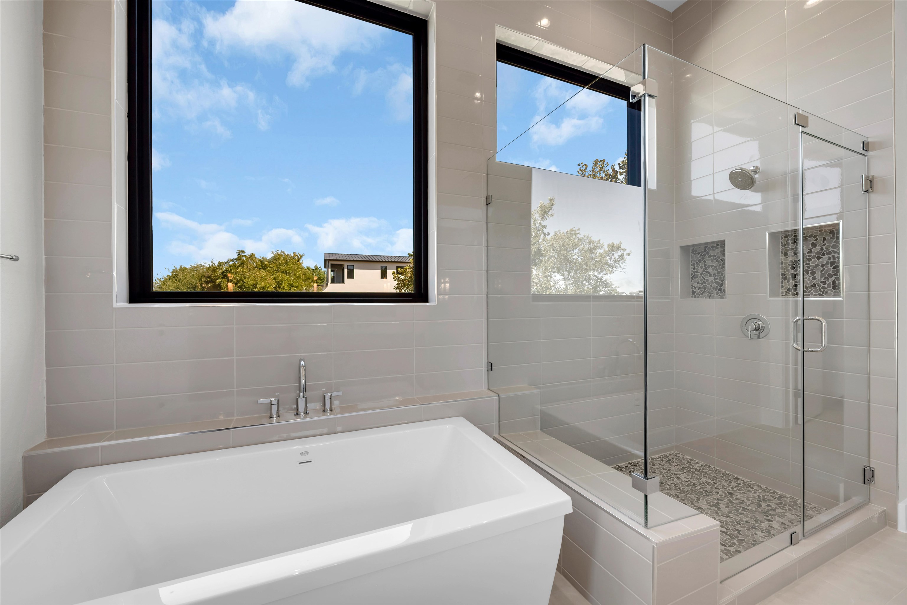 509 Lake Street Kingsland, TX 78639 - Photo 9 of 29 a bathroom with a tub and a shower