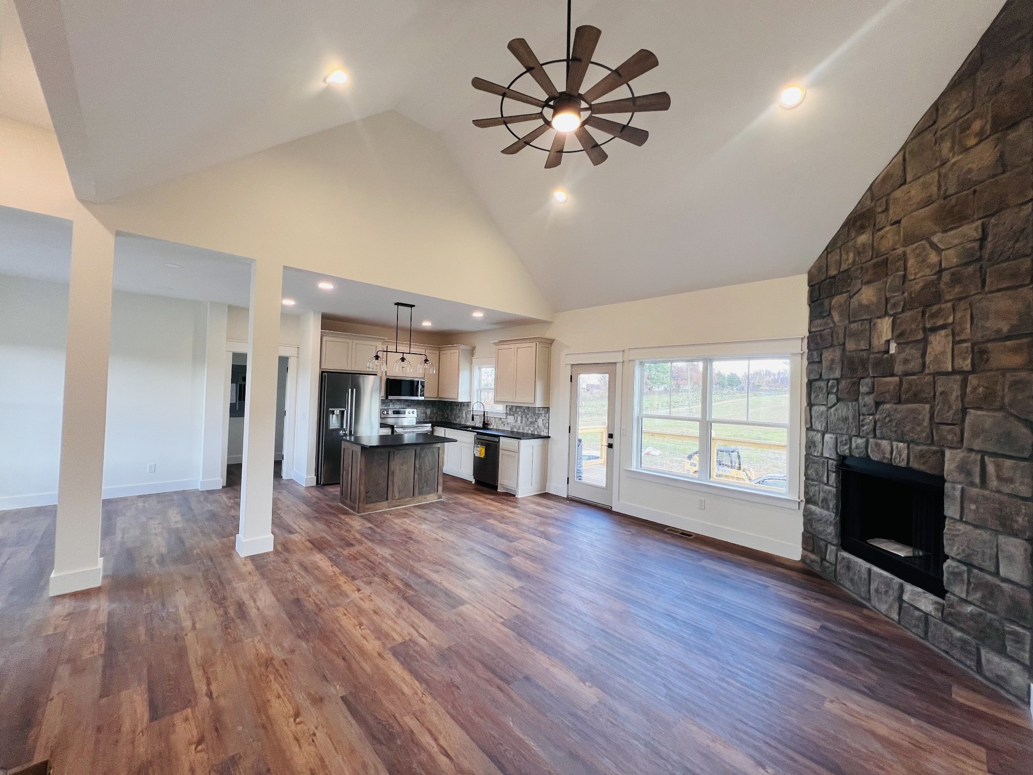 1769 Viola Road McMinnville, TN 37110 - Photo 12 of 28 a view of a livingroom with hardwood floor and a kitchen