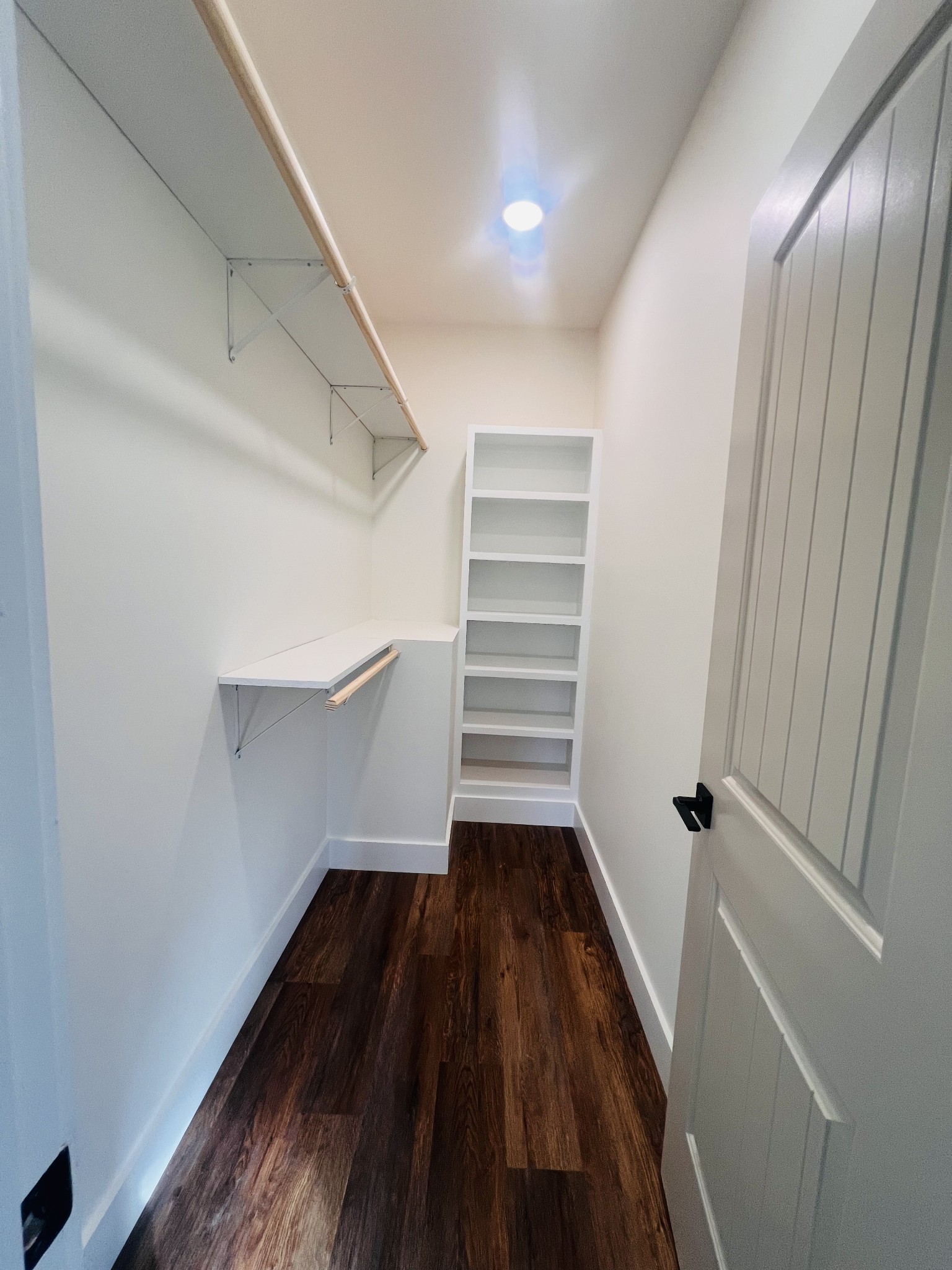 1769 Viola Road McMinnville, TN 37110 - Photo 22 of 28 a view of a hallway with wooden floor and staircase