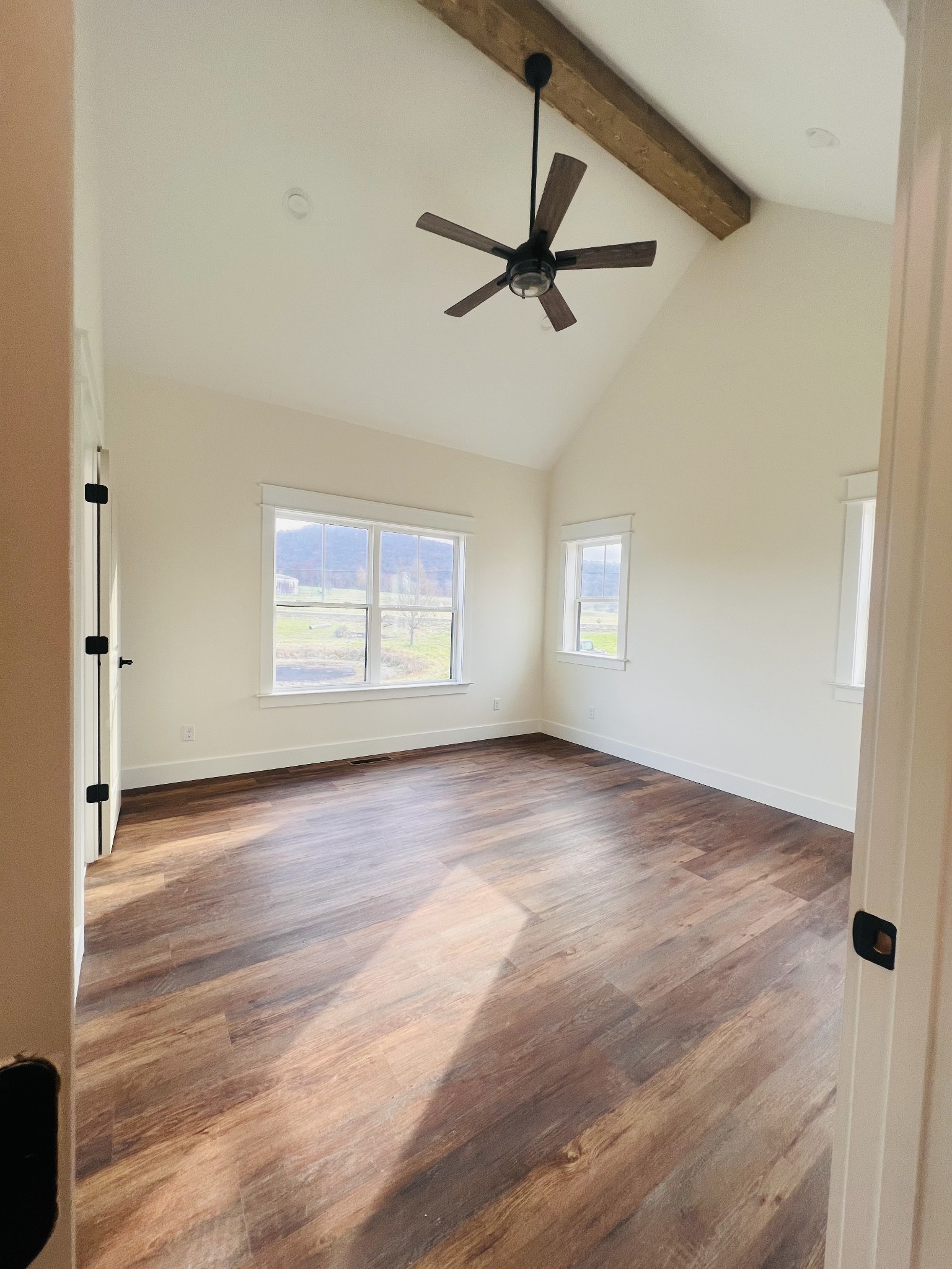 1769 Viola Road McMinnville, TN 37110 - Photo 23 of 28 a view of empty room with wooden floor and fan