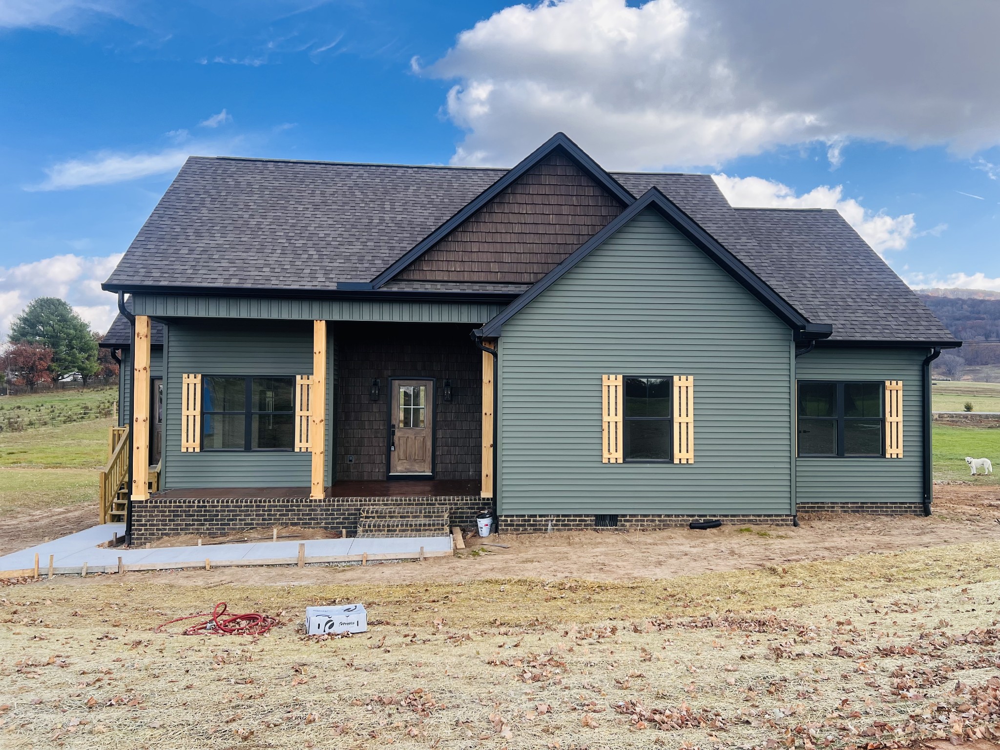 1769 Viola Road McMinnville, TN 37110 - Photo 3 of 28 a front view of a house with garden