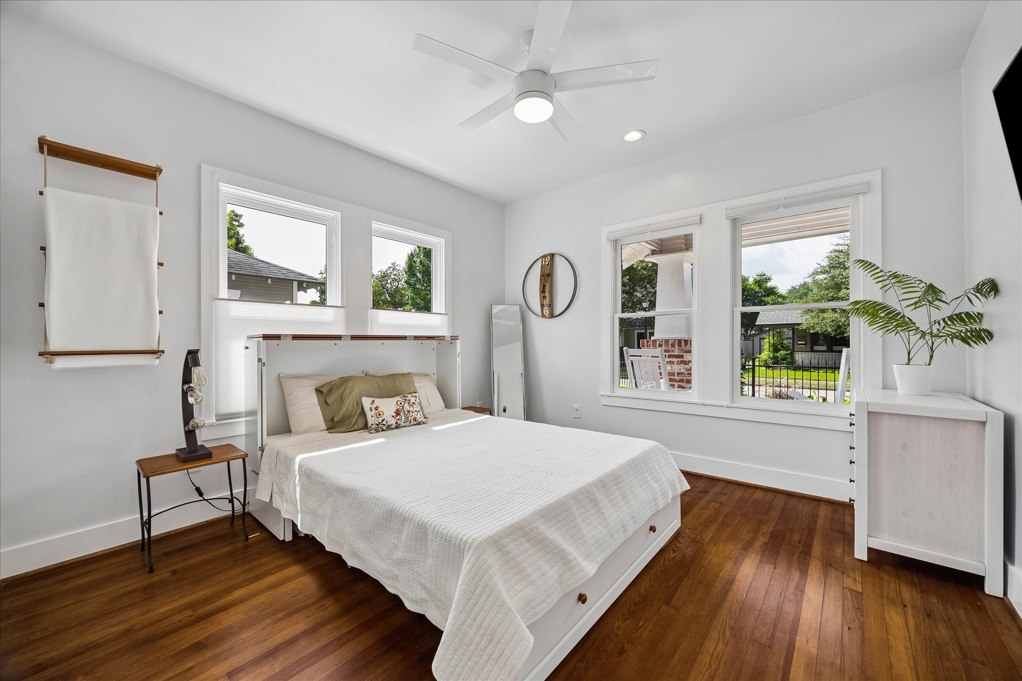 1019 East 14th Street Houston, TX 77009 - Photo 18 of 34 a bedroom with a bed and a large window