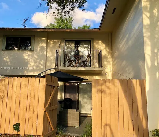 a view of a back yard of the building