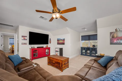 a bedroom with a bed and a furniture
