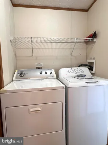 a view of a house with a sink and a yard
