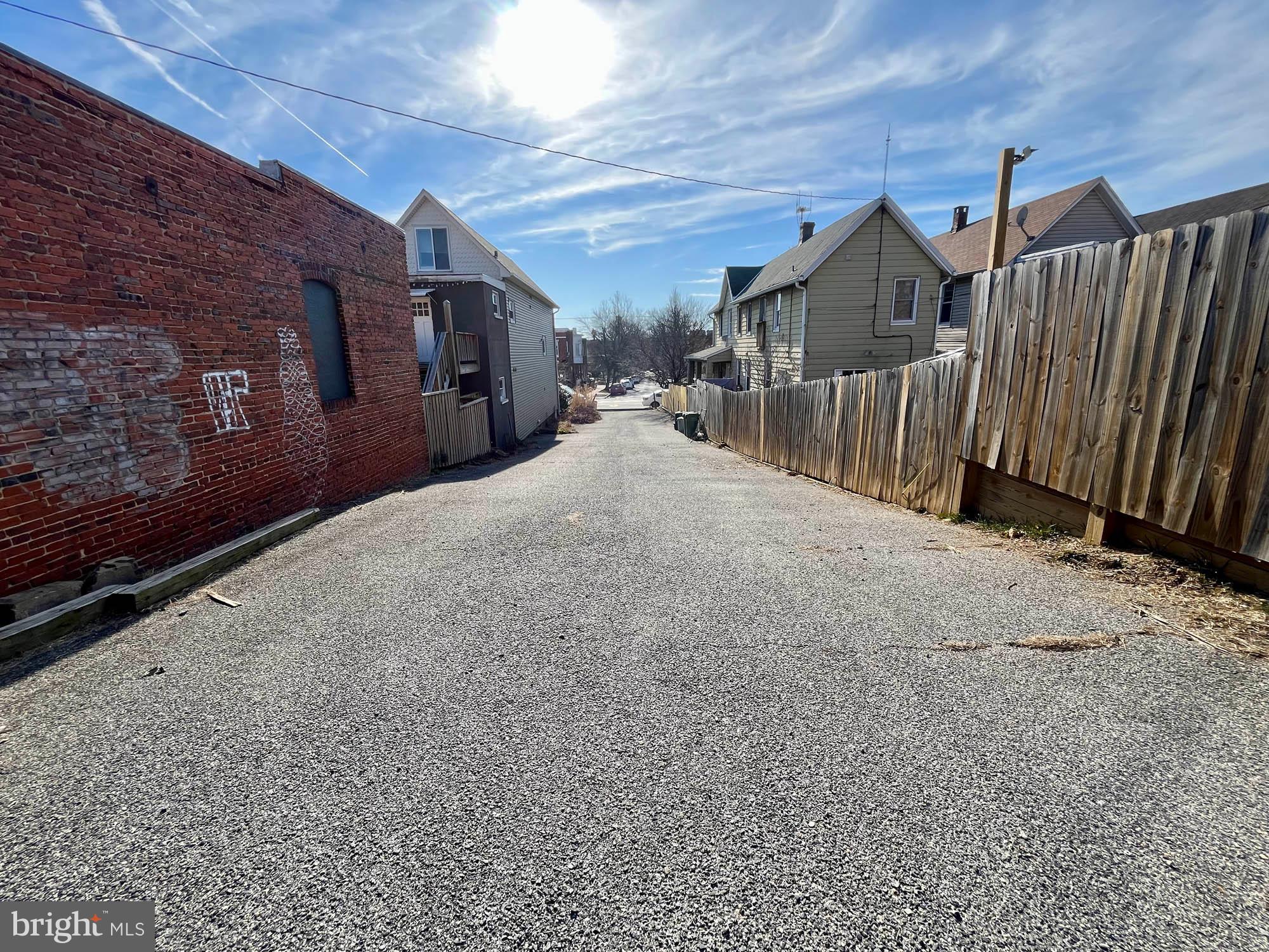 4013 Falls Road Baltimore, MD 21211 - Photo 4 of 7 a view of a house with a wooden fence