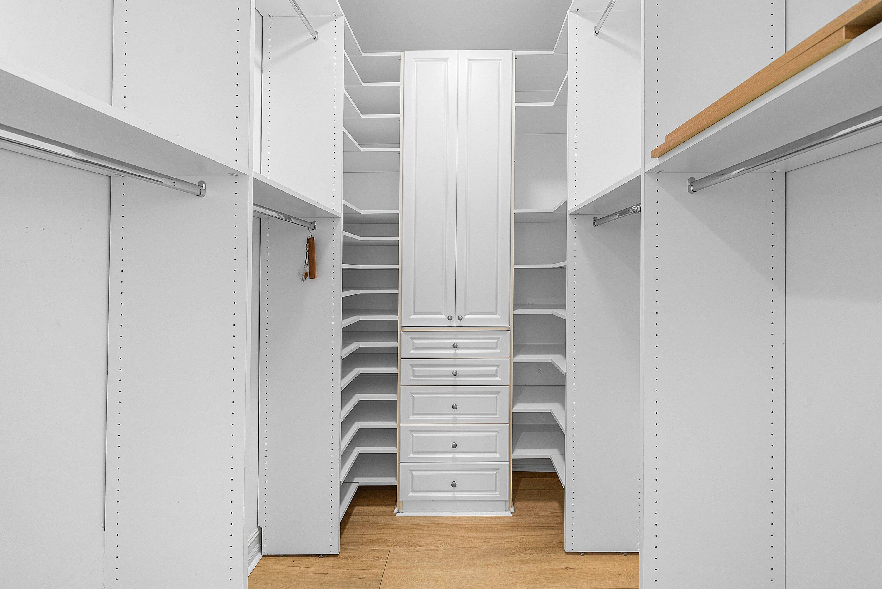 550 Southeast Mizner Boulevard, Unit B906 Boca Raton, FL 33432 - Photo 18 of 59 a view of closet area with stairs