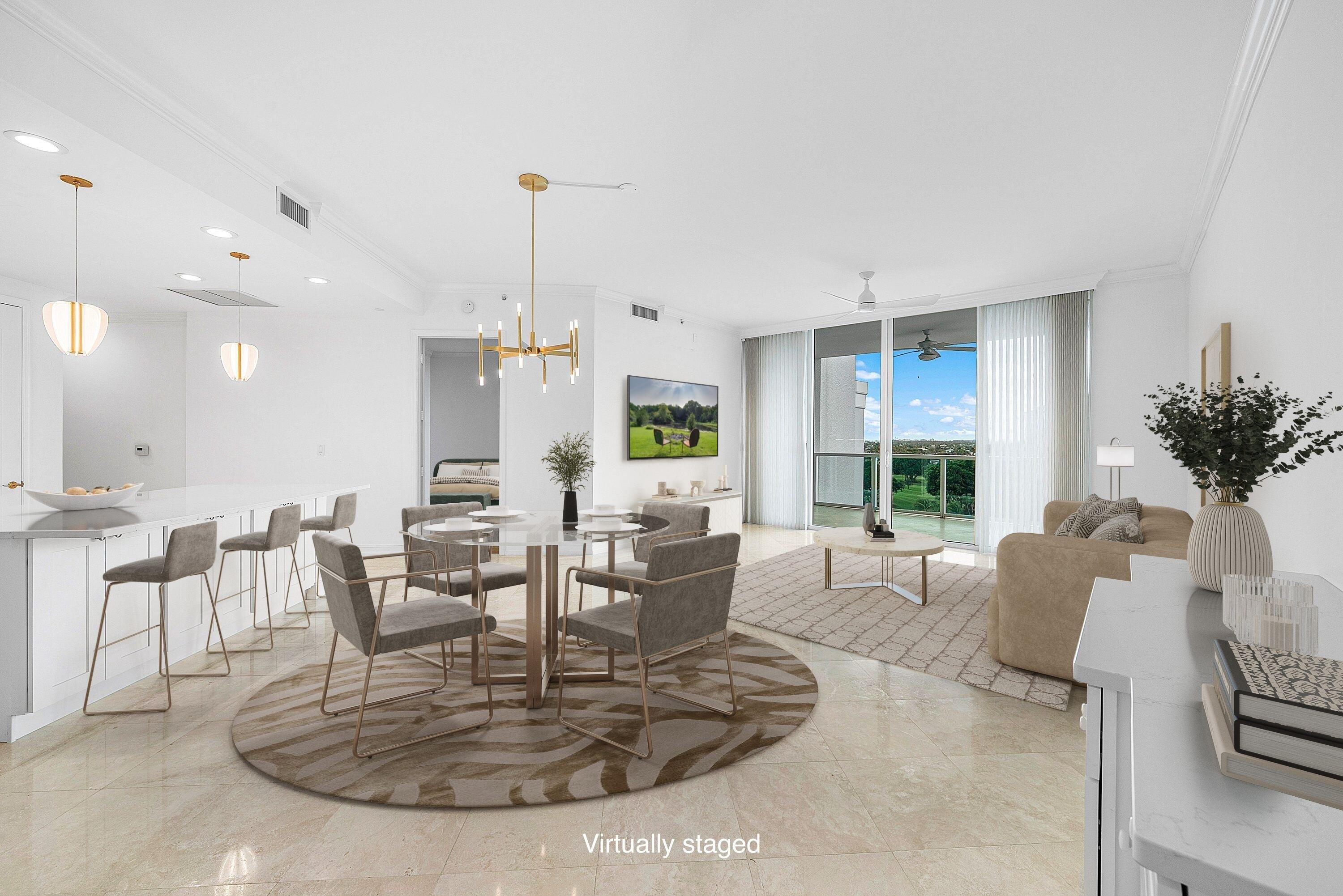 550 Southeast Mizner Boulevard, Unit B906 Boca Raton, FL 33432 - Photo 2 of 59 a living room with furniture and a large window