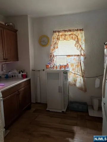 a view of a bathroom with a sink and a window