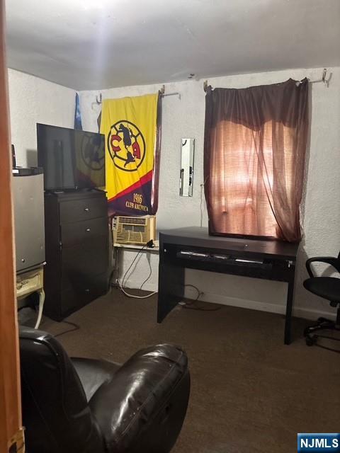 669 Scotland Road Orange, NJ 07050 - Photo 5 of 11 a room with a table chair and wall paintings