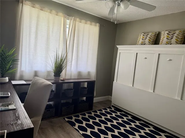 a room with furniture and window