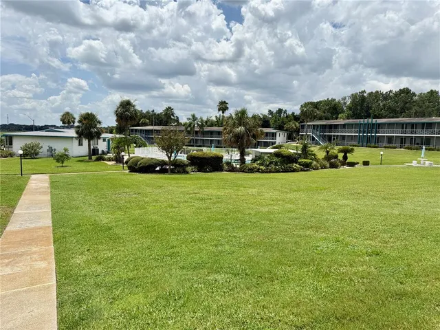 a view of a lake with a big yard
