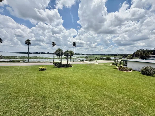 a view of a lake with a house