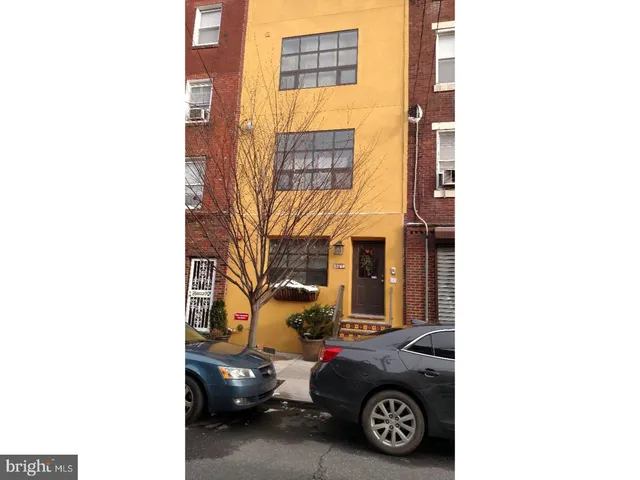 a car parked in front of a building
