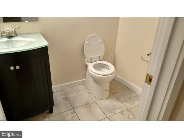 a bathroom with a sink and a toilet