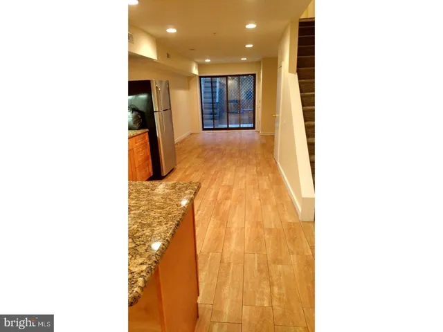 a kitchen with a sink and a microwave