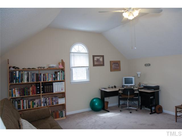 4041 Graham Sherron Road Wake Forest, NC 27587 - Photo 17 of 25 This large upstairs bedroom could be used as a bonus room also. There is a large closet and extensive attic storage.