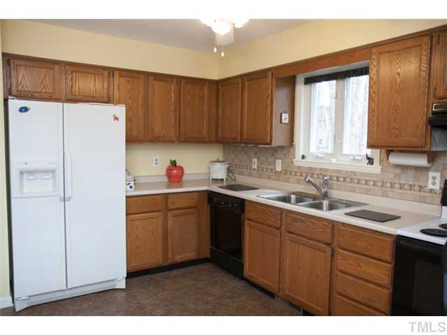 4041 Graham Sherron Road Wake Forest, NC 27587 - Photo 8 of 25 Not just for the lady of the house anymore. This kitchen has room to roam! You can have 4 people in here preparing food and not bump into each other. Lots of Counterspace!