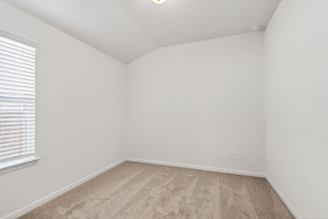 120 Honey Bee Road Jarrell, TX 76537 - Photo 14 of 20 an empty room with a window