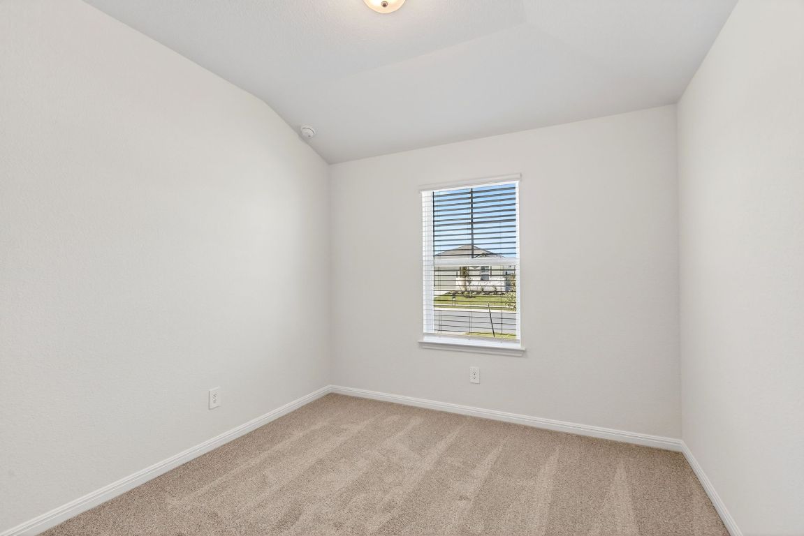 120 Honey Bee Road Jarrell, TX 76537 - Photo 15 of 20 an empty room with a window