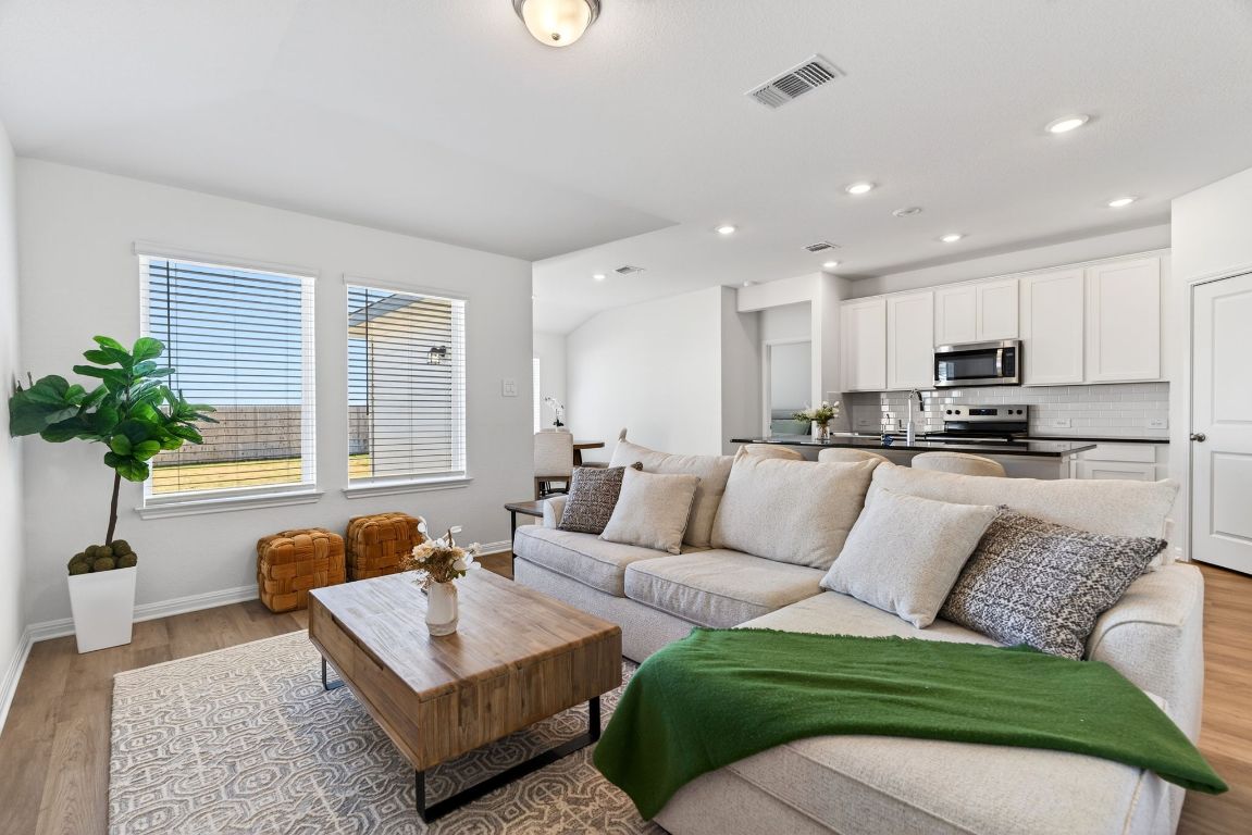 120 Honey Bee Road Jarrell, TX 76537 - Photo 2 of 20 a living room with furniture and a large window
